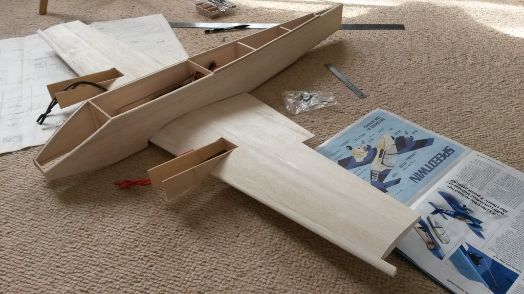 Wing locating gubbins